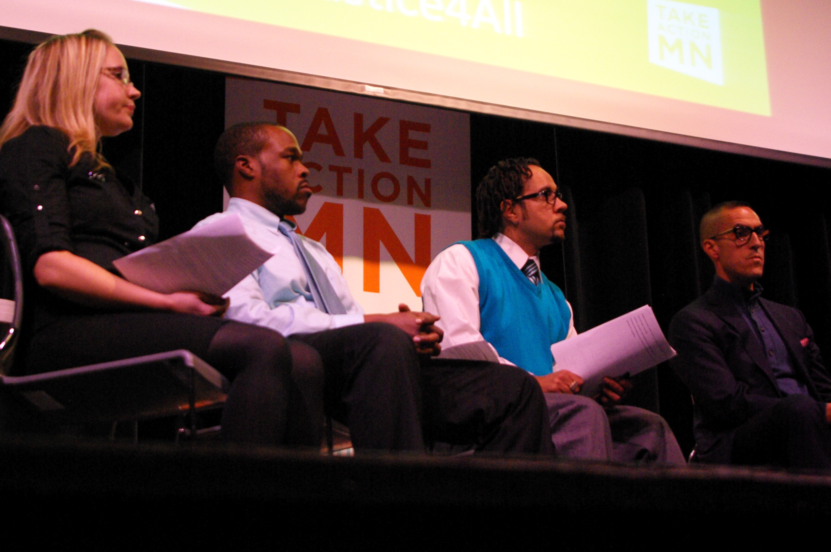 At TakeAction MN’s forum on October 24th, a panel spoke with more than 400 people about the need for employers to provide fair opportunities to job applicants who have been incarcerated.  Pictured (from left) are TakeAction MN Justice for All leaders Renee Zschokke, James Cannon, Jr., and Larcell Mack, and, on the far right, Jim Rowader, Vice President and General Council for Employee and Labor Relations at the Target Corporation.